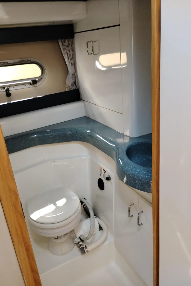Slide: The Image of Bathroom interior of 1992 Bayliner 4388 Motoryacht with toilet and sink. - 35