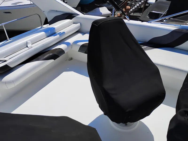 Slide: The Image of 1992 Bayliner 4388 Motoryacht deck with covered seating and sleek design. - 9