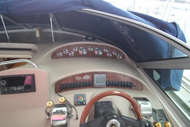 Slide: The Image of 2001 Sea Ray 340 Sundancer helm with instruments. - 10