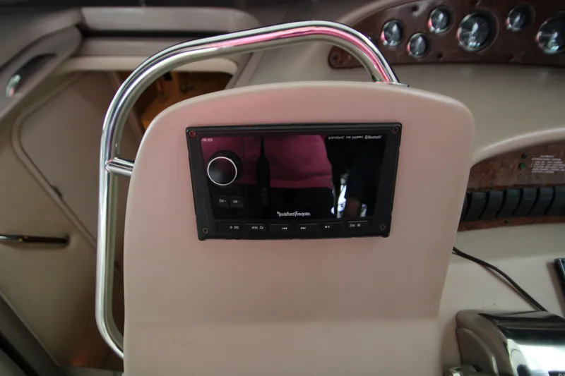 Slide: The Image of Dashboard of a 2001 Sea Ray 340 Sundancer boat. - 11