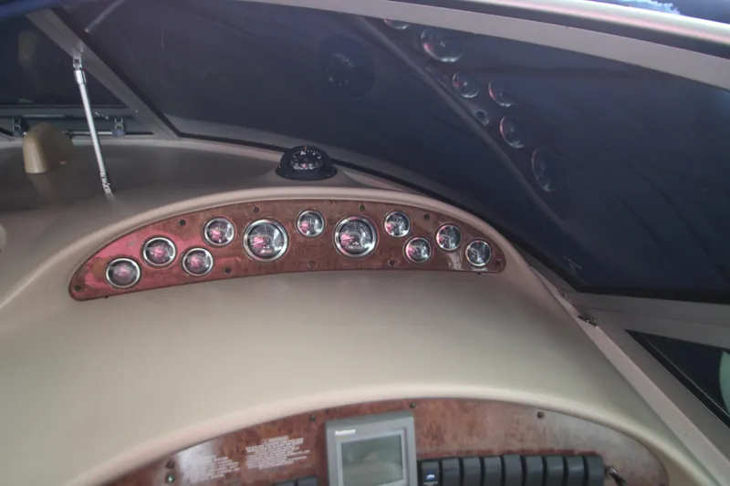 Slide: The Image of Dashboard of a 2001 Sea Ray 340 Sundancer boat. - 14