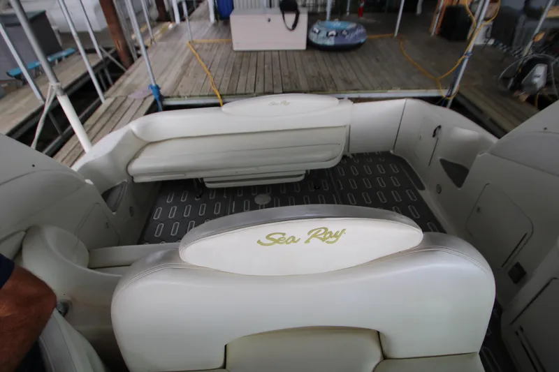Slide: The Image of Interior of a 2001 Sea Ray 340 Sundancer with white seating. - 16
