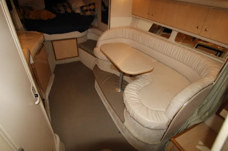 Slide: The Image of Interior of 2001 Sea Ray 340 Sundancer with cozy seating area. - 20
