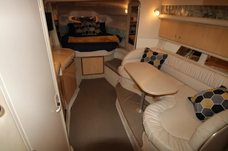 Slide: The Image of Interior of 2001 Sea Ray 340 Sundancer with cozy seating area. - 21