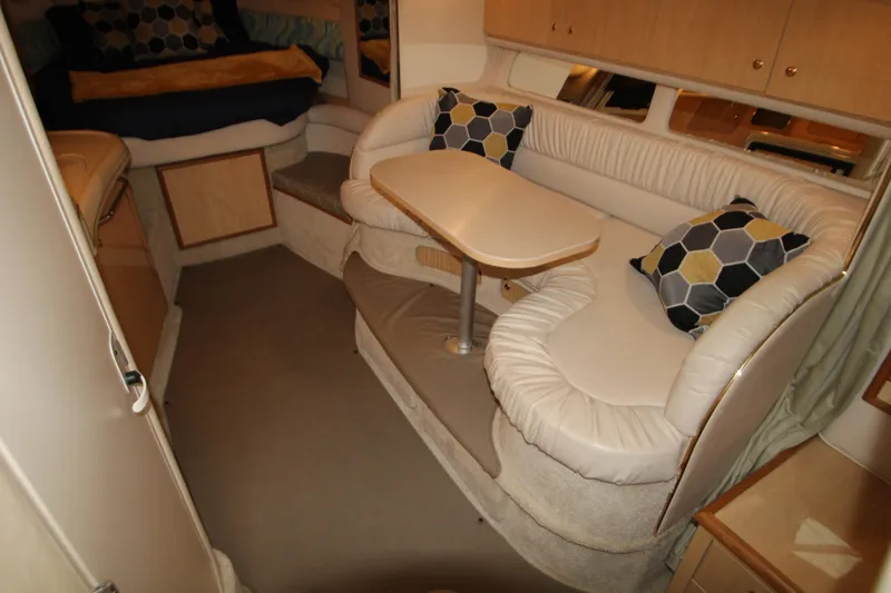 Slide: The Image of Interior of 2001 Sea Ray 340 Sundancer with cozy seating area. - 25