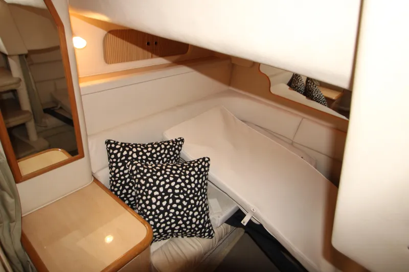 Slide: The Image of Interior of 2001 Sea Ray 340 Sundancer with cushions and mirror. - 27