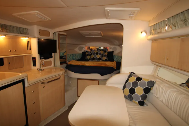Slide: The Image of Interior of 2001 Sea Ray 340 Sundancer with cozy cabin. - 31