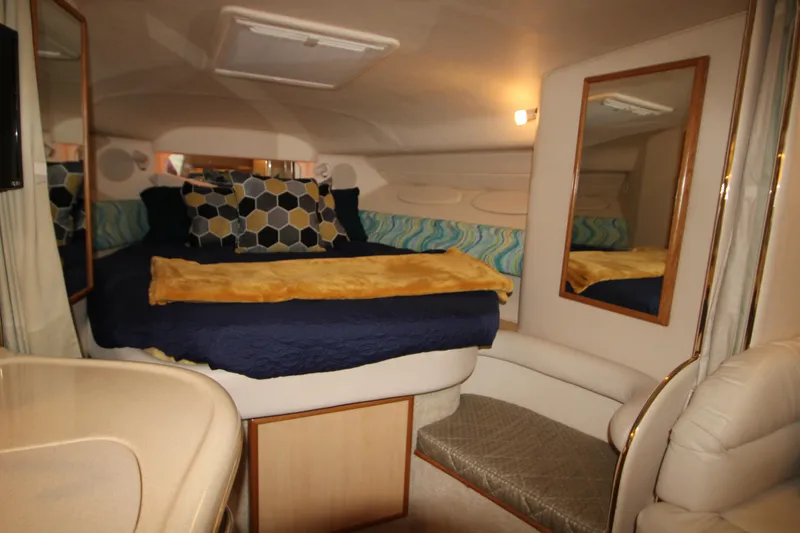 Slide: The Image of Interior of 2001 Sea Ray 340 Sundancer with cozy bed. - 34
