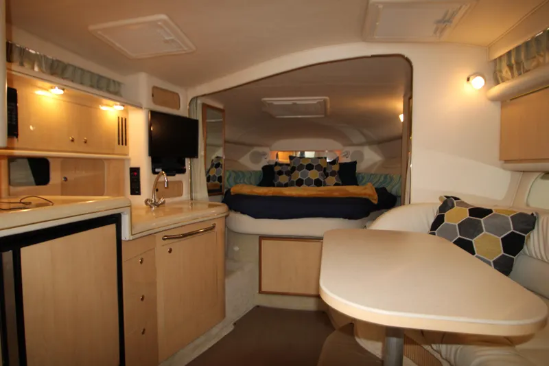 Slide: The Image of Interior of 2001 Sea Ray 340 Sundancer with kitchen and sleeping area. - 41