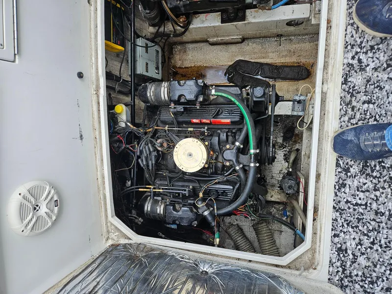 Slide: The Image of 1988 Trojan International engine compartment with visible wiring and components. - 15