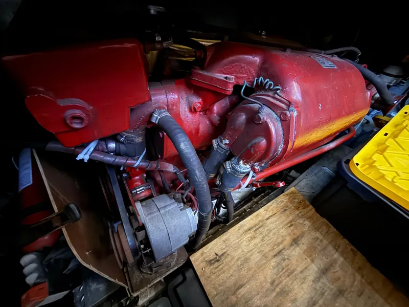 Slide: The Image of 1986 Kha Shing Nautique engine, red and yellow components, detailed view. - 30