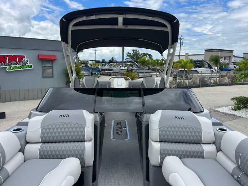 Slide: The Image of 2026 Avalon 2785 Excalibur LTD boat with quad lounger and Mercury 400hp V-10 engine. - 15