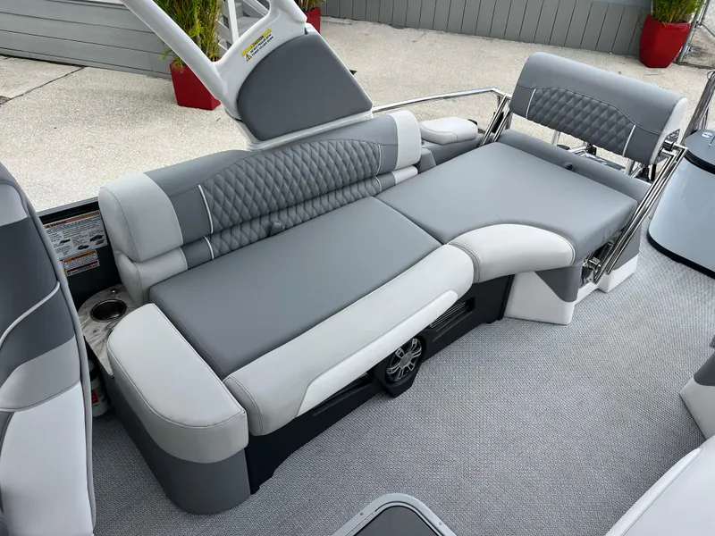 Slide: The Image of Luxurious seating on 2026 Avalon 2785 Excalibur LTD Windshield Quad Lounger, featuring elegant gray upholstery. - 20