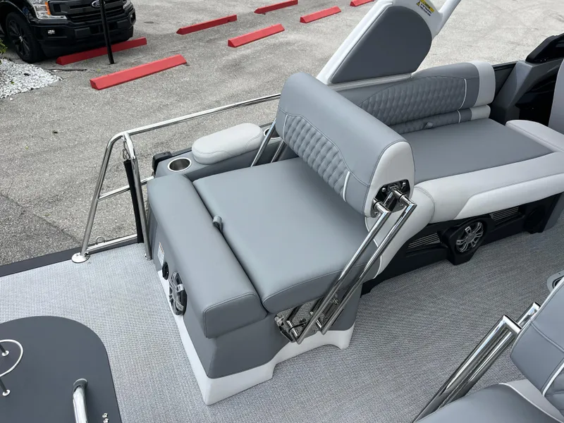 Slide: The Image of Luxurious seating on 2026 Avalon 2785 Excalibur LTD Windshield Quad Lounger boat. - 21