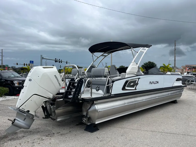 Slide: The Image of 2026 Avalon 2785 Excalibur LTD Tri-toon boat with Mercury 400hp V-10 engine. - 5