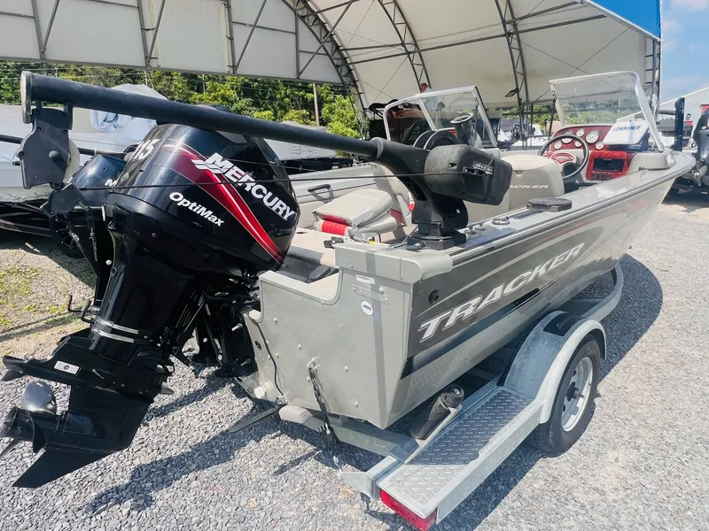 Slide: The Image of 2004 Tracker Targa WT boat with Mercury OptiMax engine on trailer. - 19