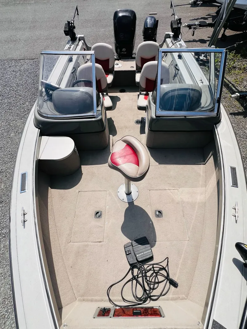Slide: The Image of 2004 Tracker Targa WT boat interior with seating and equipment, viewed from above. - 23