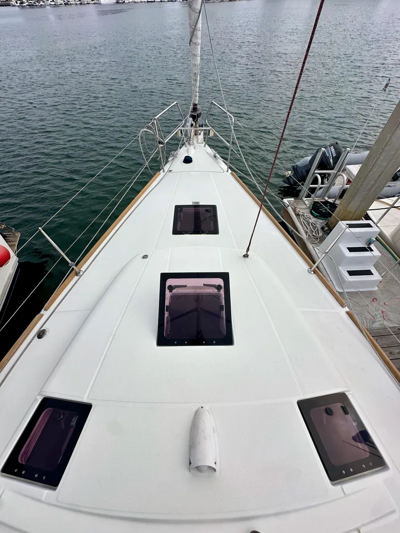 Slide: The Image of 2012 Beneteau Sense 43 yacht deck view at marina. - 21