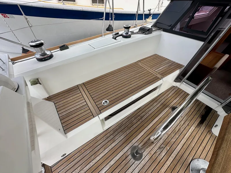 Slide: The Image of Beneteau Sense 43 yacht cockpit with teak flooring and winches, 2012 model. - 34