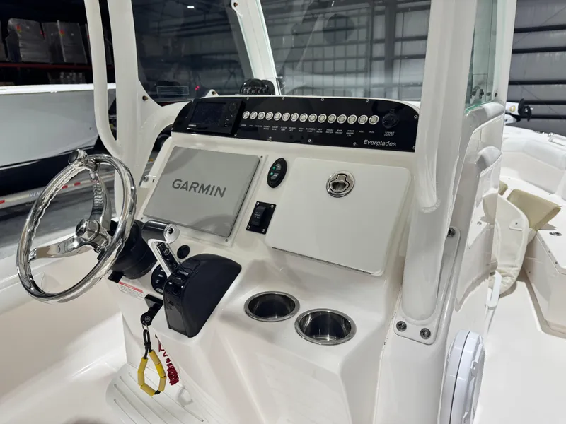 Slide: The Image of Control console of a 2014 Everglades 243 CC boat with Garmin navigation system. - 4
