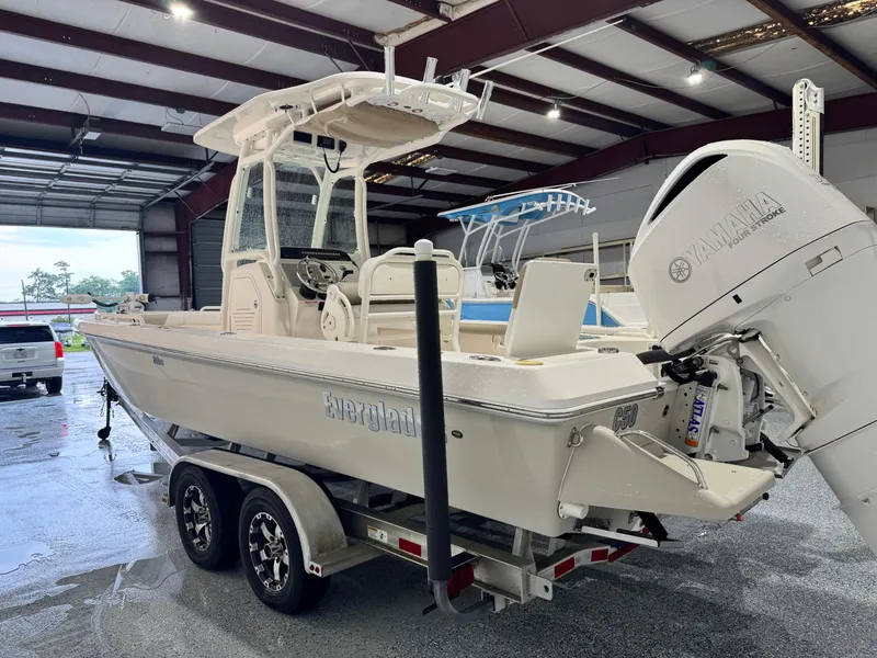 Slide: The Image of 2014 Everglades 243 CC boat with Yamaha engine on trailer in warehouse. - 6