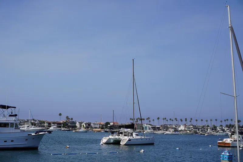 Slide: The Image of Fountaine Pajot Venezia 42 catamaran in a serene marina, 1995 model. - 5