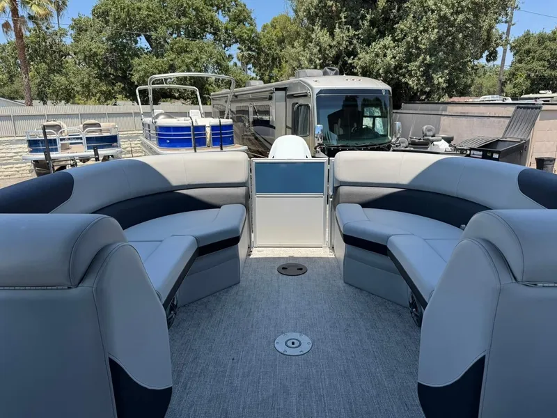 Slide: The Image of 2025 South Bay 222 LE pontoon boat interior with spacious seating and modern design. - 11