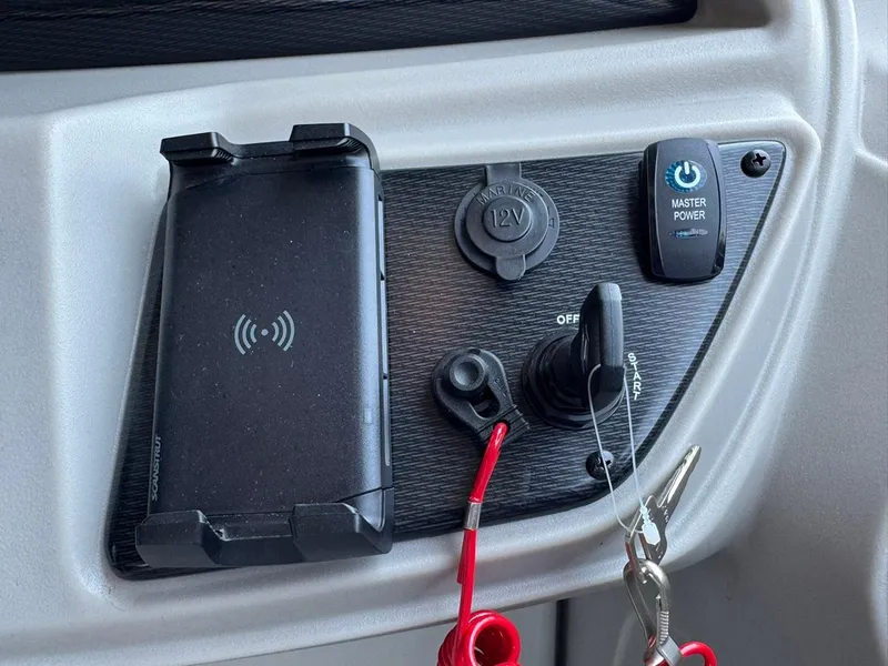 Slide: The Image of Control panel of 2025 South Bay 222 LE with power switch and key ignition. - 20