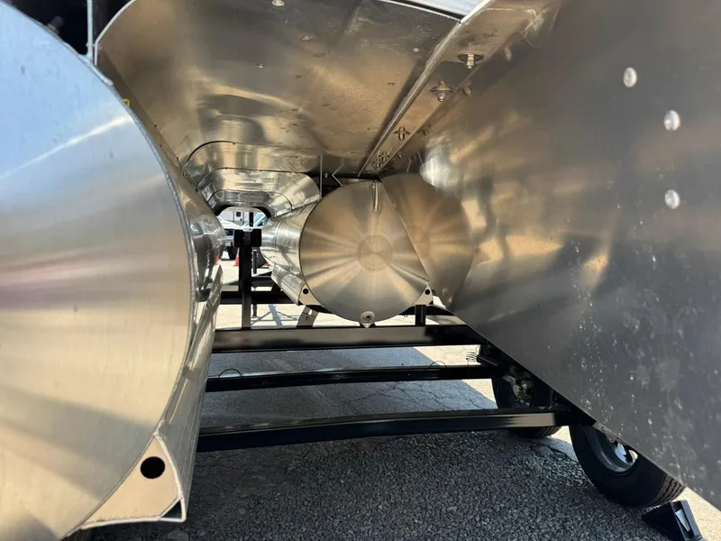 Slide: The Image of Underneath view of 2025 South Bay 222 LE pontoon boat, showcasing aluminum pontoons and structure. - 30