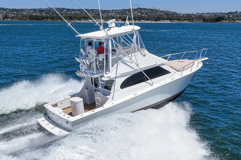 Slide: The Image of 2009 Egg Harbor 37 SportYacht cruising on blue ocean waters. - 10