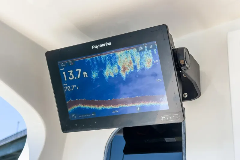 Slide: The Image of Raymarine display on 2009 Egg Harbor 37 SportYacht showing depth and water temperature. - 24