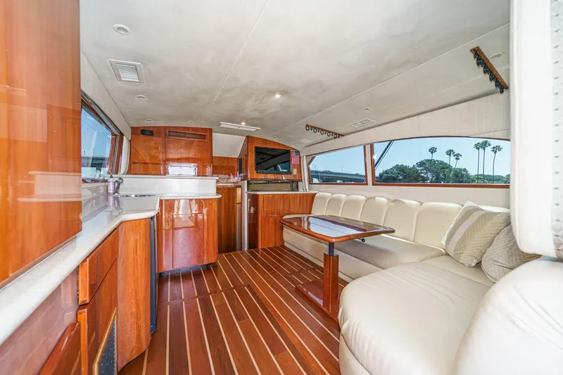 Slide: The Image of Luxurious interior of 2009 Egg Harbor 37 SportYacht with wood finishes and plush seating. - 32