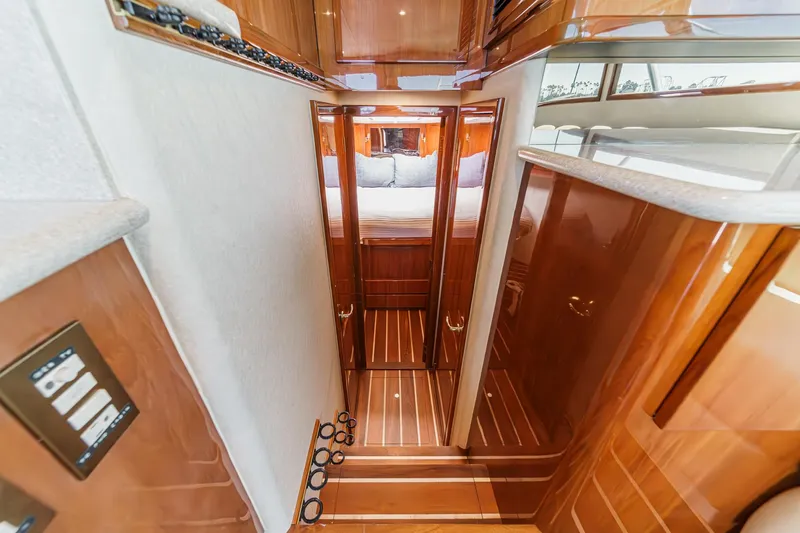 Slide: The Image of Interior of 2009 Egg Harbor 37 SportYacht with polished wood finish and cozy cabin. - 39