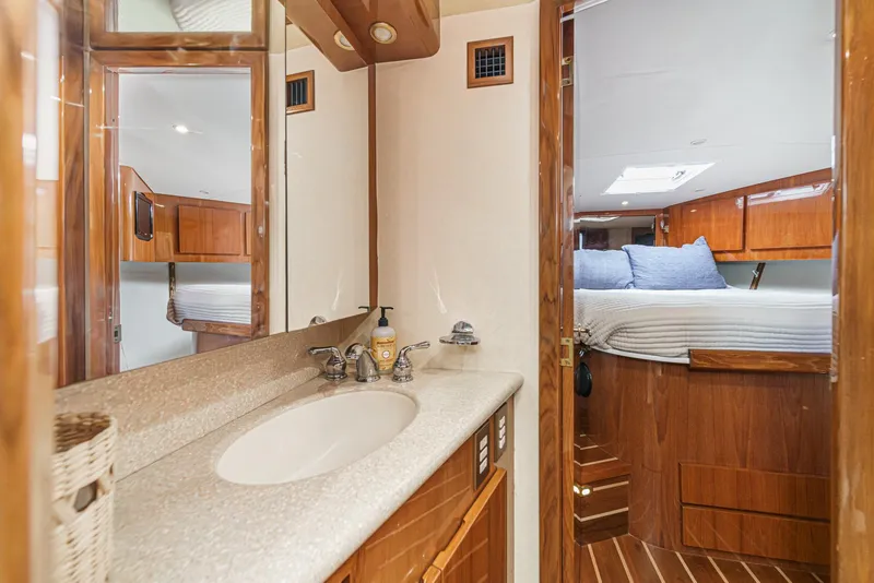 Slide: The Image of Luxurious bathroom and bedroom interior of 2009 Egg Harbor 37 SportYacht with wooden finishes. - 45