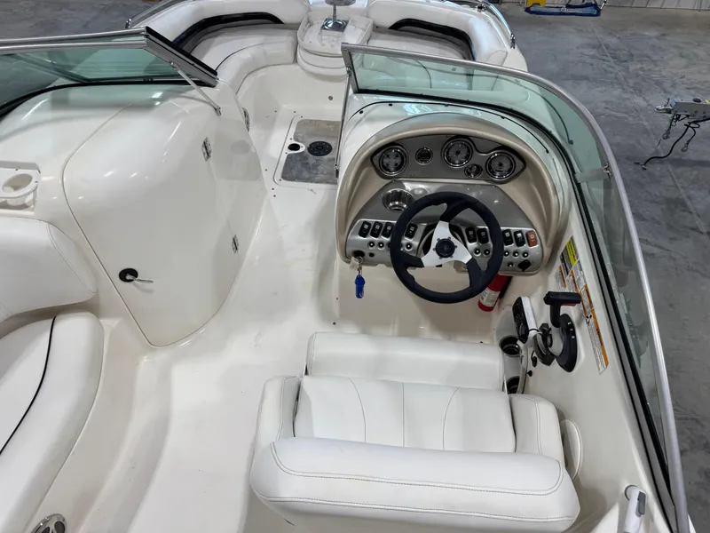 Slide: The Image of 2011 Hurricane SD217 boat on trailer in indoor showroom. - 4