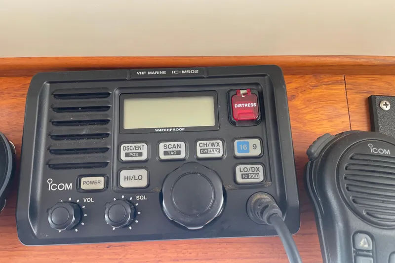 Slide: The Image of VHF marine radio on 1964 Grand Banks 42 Classic boat dashboard. - 25