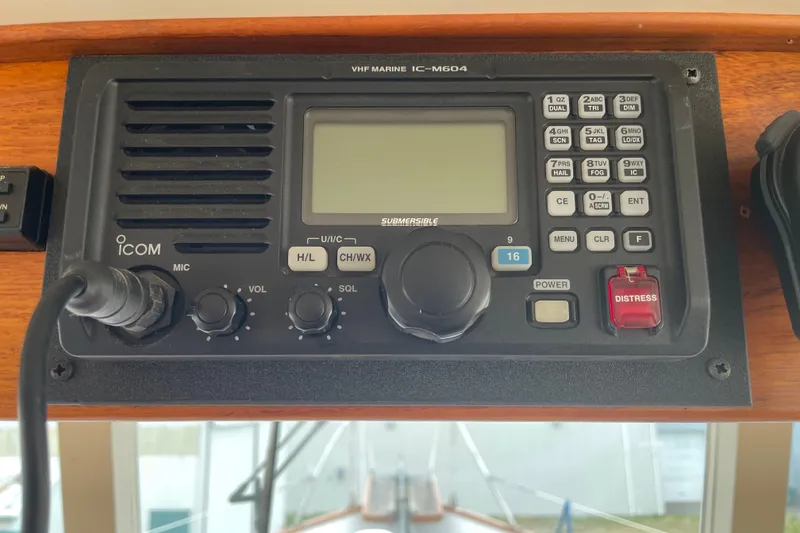 Slide: The Image of VHF Marine IC-M604 radio on 1964 Grand Banks 42 Classic boat dashboard. - 26