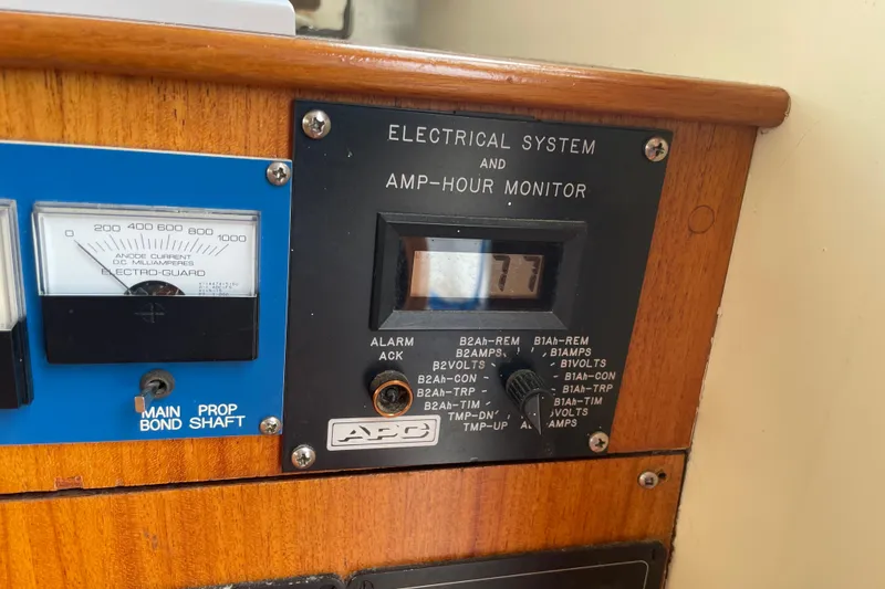 Slide: The Image of Electrical system and amp-hour monitor on 1964 Grand Banks 42 Classic boat. - 33
