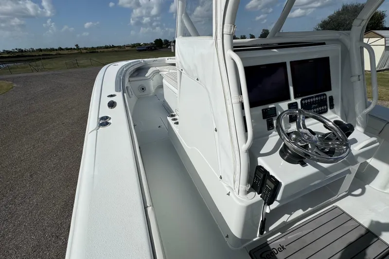 Slide: The Image of Aerial view of 2020 Yellowfin 36 Offshore boat on water. - 14