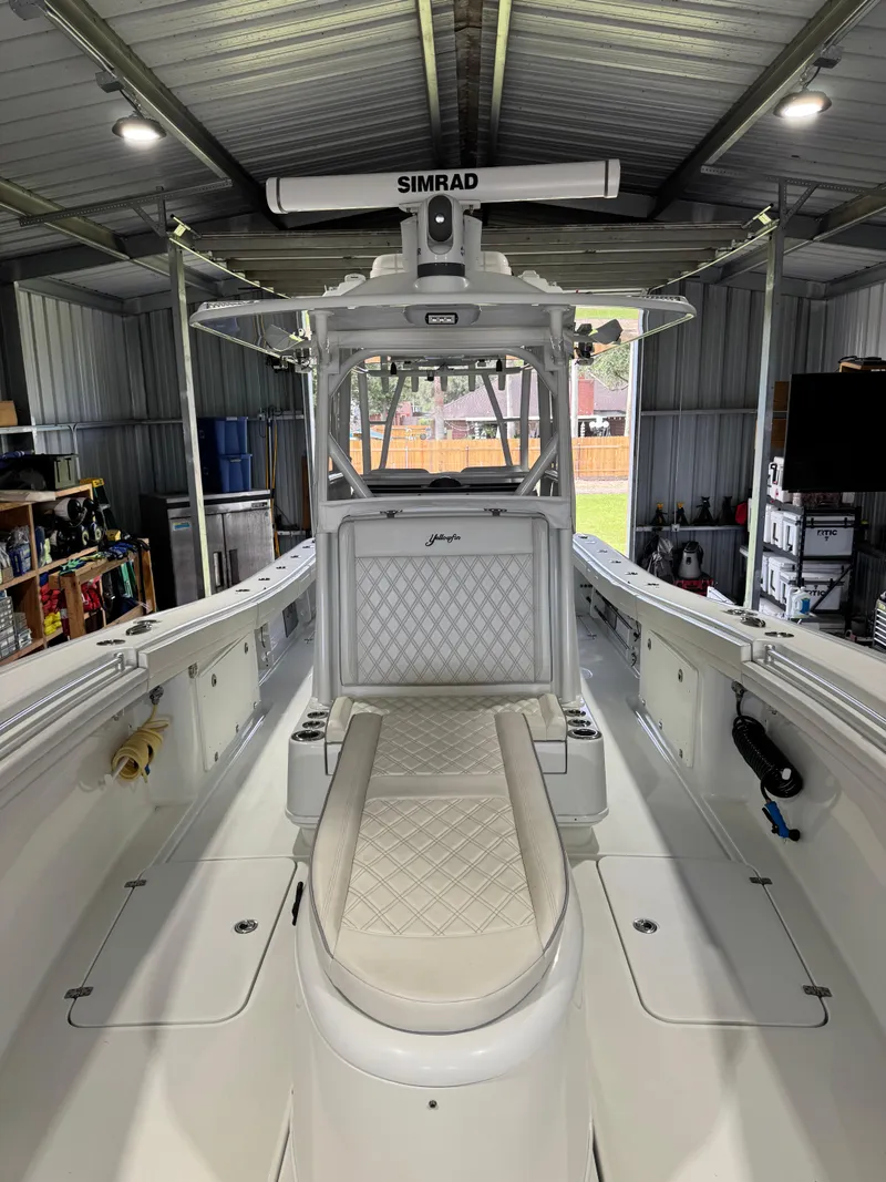 Slide: The Image of 2020 Yellowfin 36 Offshore boat on trailer under blue sky. - 19