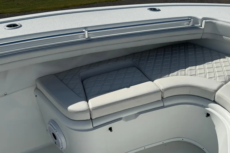 Slide: The Image of 2020 Yellowfin 36 Offshore boat in a garage, showcasing sleek design and spacious interior. - 36