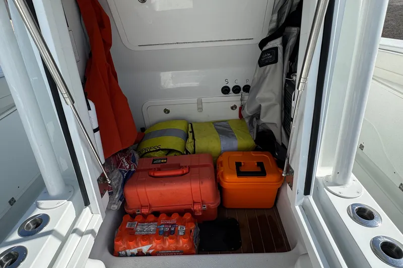 Slide: The Image of Storage area of 2020 Yellowfin 36 Offshore boat with safety gear and supplies. - 72