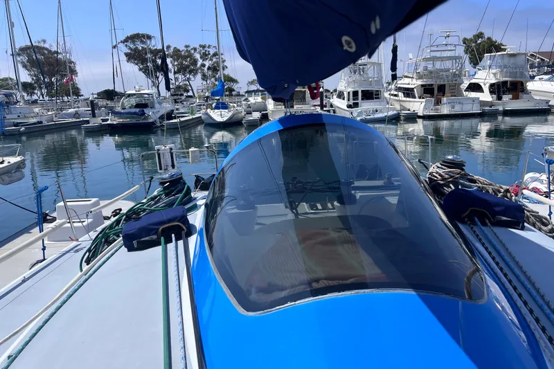 Slide: The Image of Class 40 Antrim Design sailboat docked in a marina, 2009 model. - 11