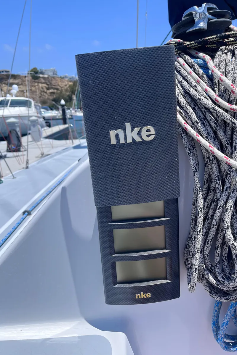 Slide: The Image of Sailing instrument panel on Class 40 Antrim Design yacht, 2009, with ropes and clear sky. - 20