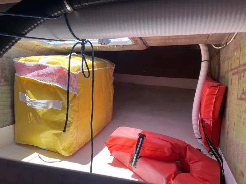 Slide: The Image of Storage compartment with yellow and red safety gear, Class 40 Antrim Design, 2009. - 36