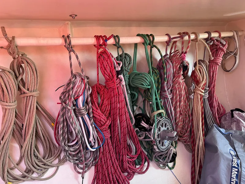 Slide: The Image of Assorted ropes neatly hung in a Class 40 Antrim Design boat, 2009 model. - 40