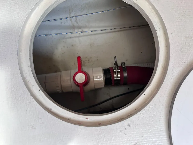 Slide: The Image of Red valve inside Class 40 Antrim Design boat, 2009 model. - 43