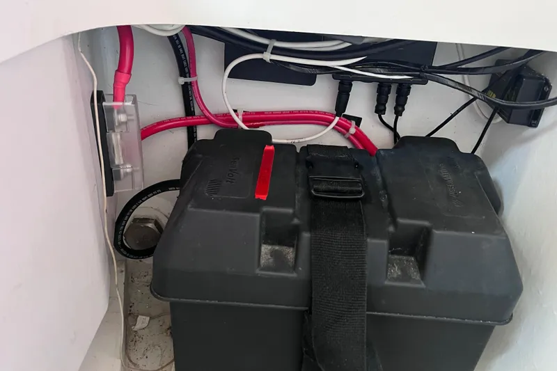 Slide: The Image of Battery compartment with wiring in a 2009 Class 40 Antrim Design boat. - 46