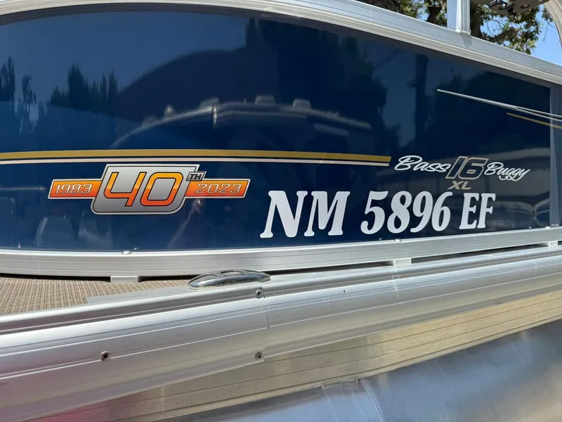 Slide: The Image of 2023 Sun Tracker Bass Buggy 16 XL Select boat with 40th anniversary decal. - 21