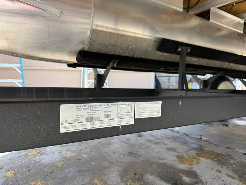 Slide: The Image of 2023 Sun Tracker Bass Buggy 16 XL Select trailer label close-up. - 24